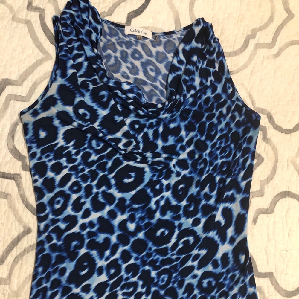 Calvin Klein’s cowl neck blouse